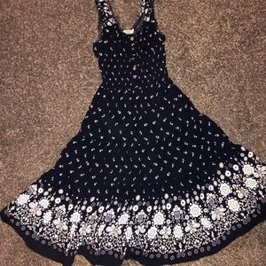 Long dress with floral pattern.